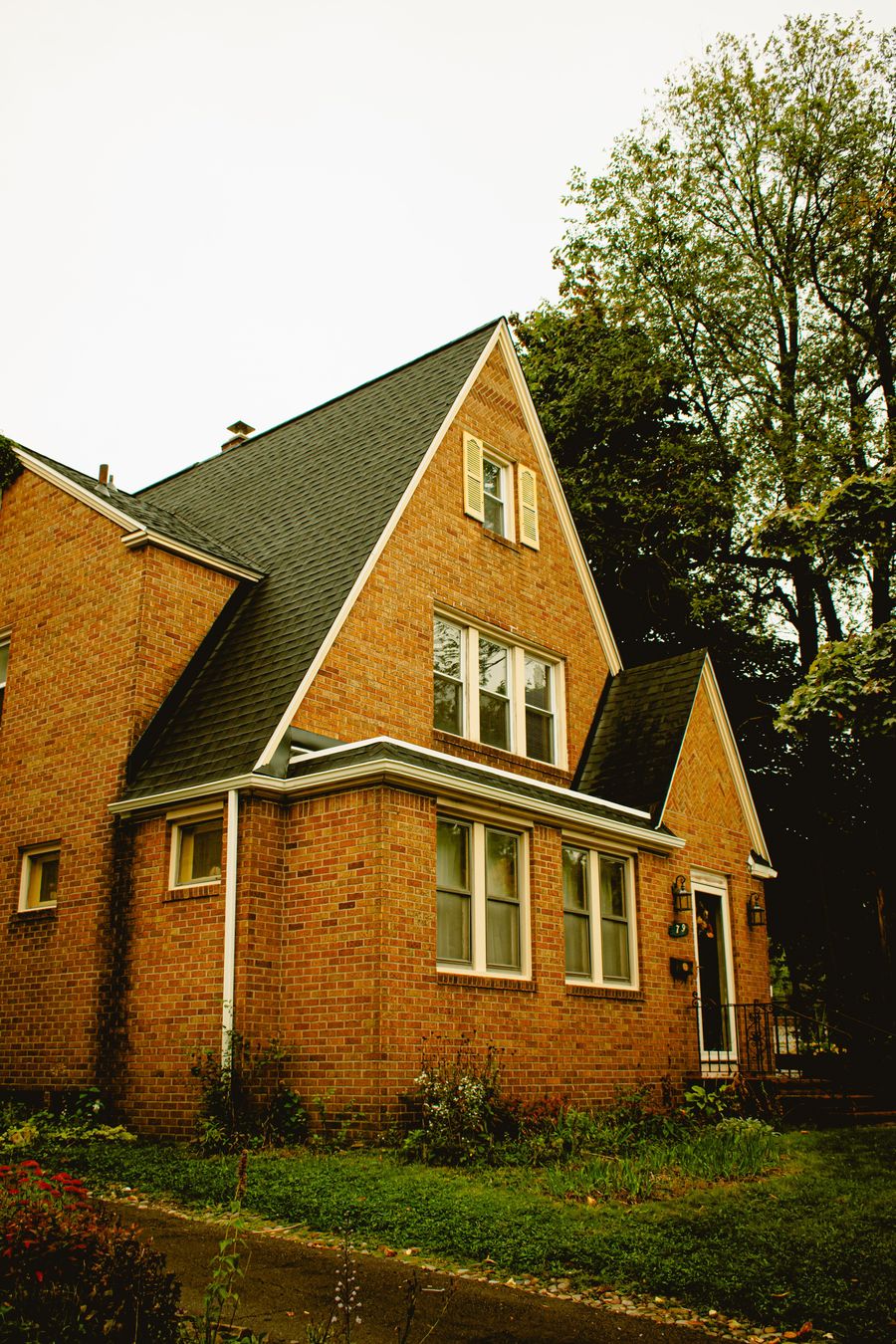 Brick home with a covered front porch in the Little Rock area